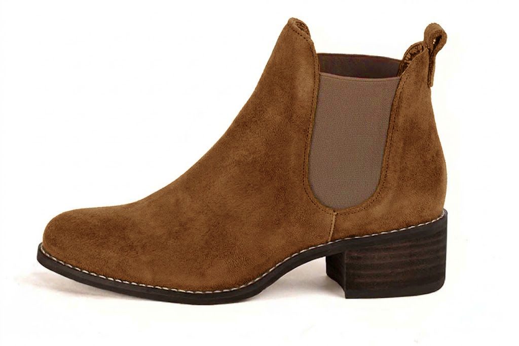 Elevate your look with solid-color leather Chelsea boots featuring sleek elastic side panels and effortless Parisian elegance, in cognac and bronze leather with round toe and leather sole - Florence KOOIJMAN